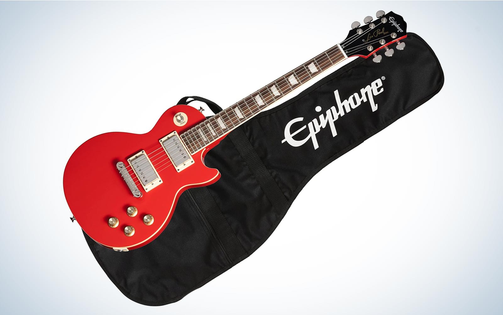 A red Epiphone Power Player Les Paul guitar leaning to the right on its case on a plain background